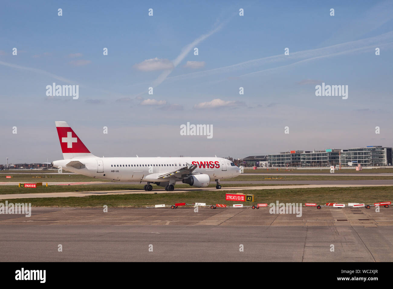 Swiss Airlines commercial jet at Heathrow Airport, London. Stock Photo