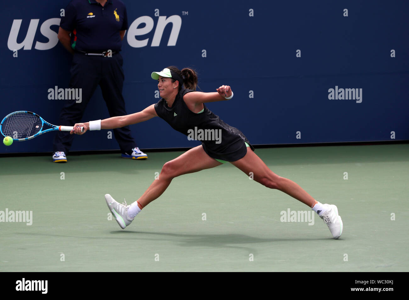 New York, USA. 27th Aug, 2019. Garbiñe Muguruza Blanco of Spain reaches wide for a forehand during her first round match against Alison Riske of the United States at the US Open in Flushing Meadows, New York.  Risks won the match in three sets Credit: Adam Stoltman/Alamy Live News Stock Photo
