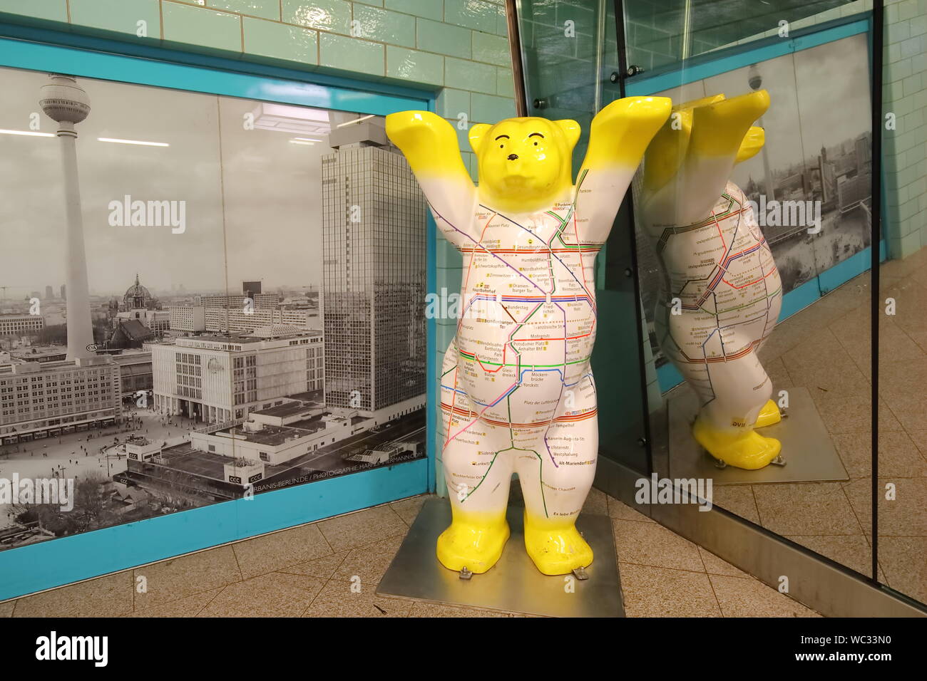 Buddy Bears doll with Berlin train map in Berlin Germany Stock Photo