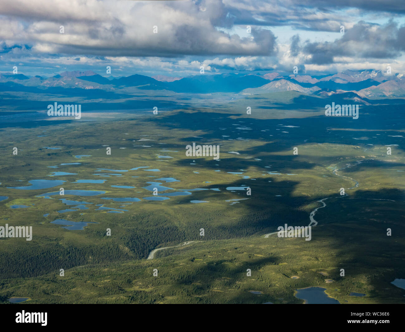 The incredible views of the Denali range in Denali National Park while flight seeing from a plane from Kantishna Alaska Stock Photo