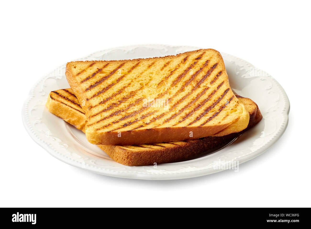 Dish with two roasted slices of bread on white Stock Photo