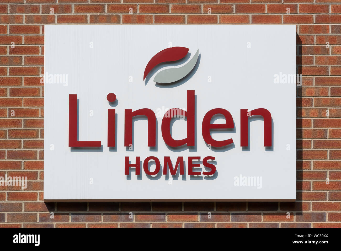 Signage indicating the sale of Linden Homes houses (part of Galliford Try) located in the Brunswick area of Manchester, UK. (Editorial use only). Stock Photo