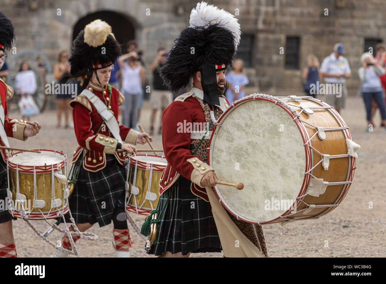A member of the 78th Highlanders plays the drum as the regiment leaves the Halifax Citadel for a Freedom of the City march into the street of Halifax, Stock Photo