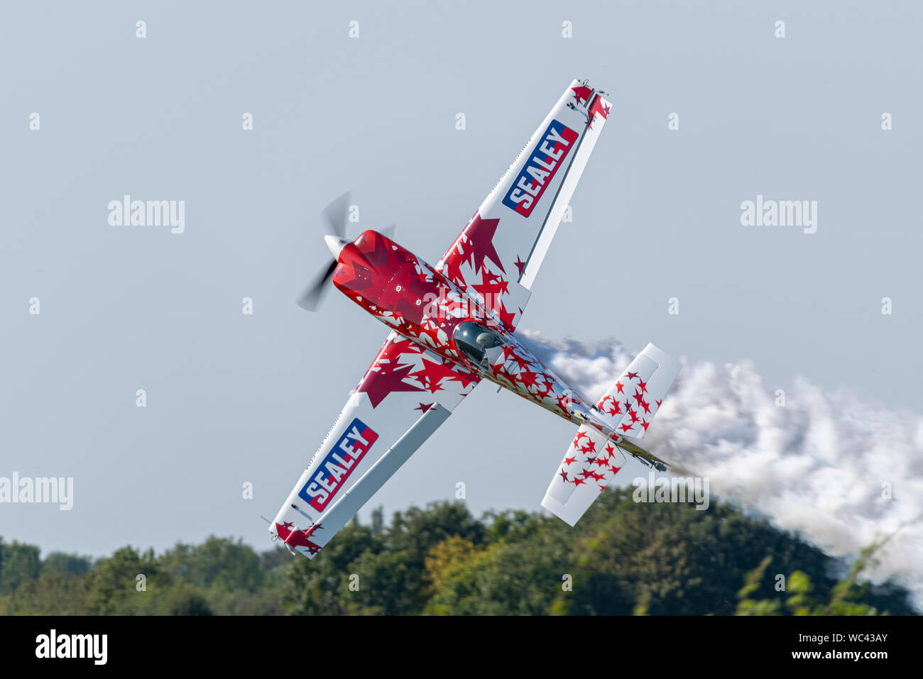 Mark Jefferies knife edge take off in Extra 300 aerobatic plane at the