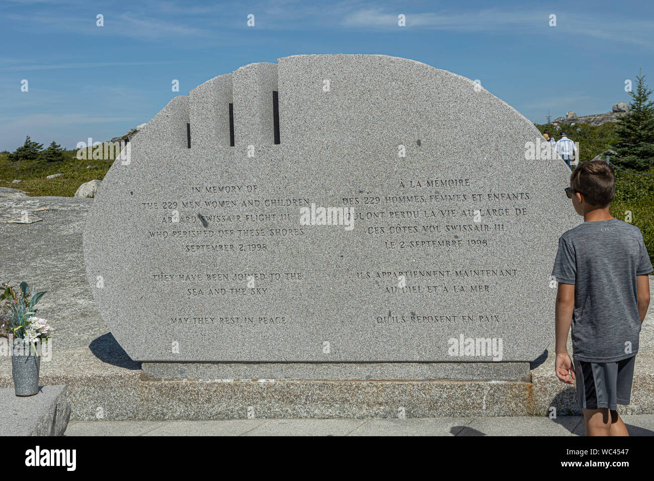 A young boy looks at the Swissair Memorial near Peggy’s Cove, Nova