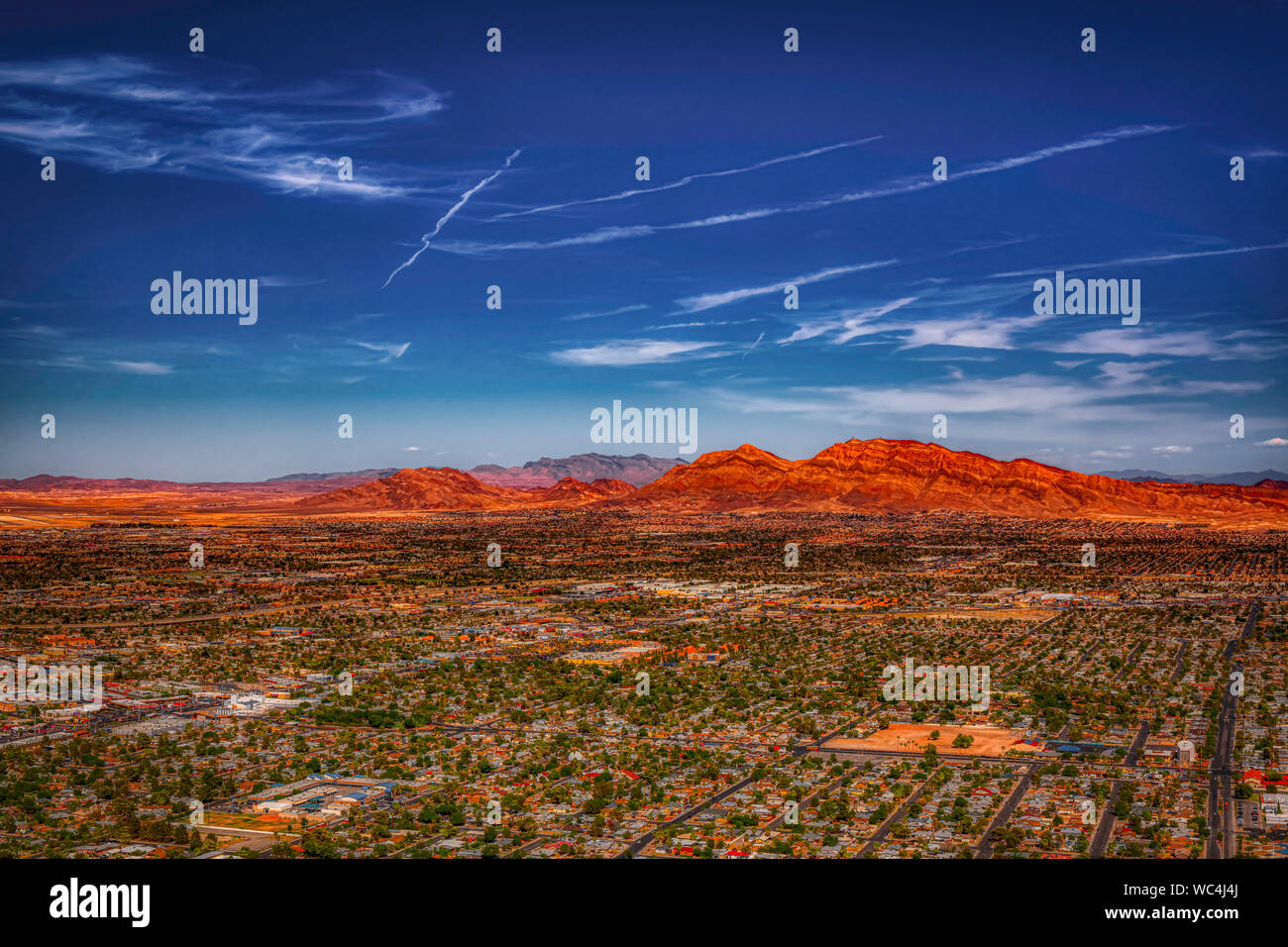 Aerial view of Las Vegas houses in the valley and mountains in the ...