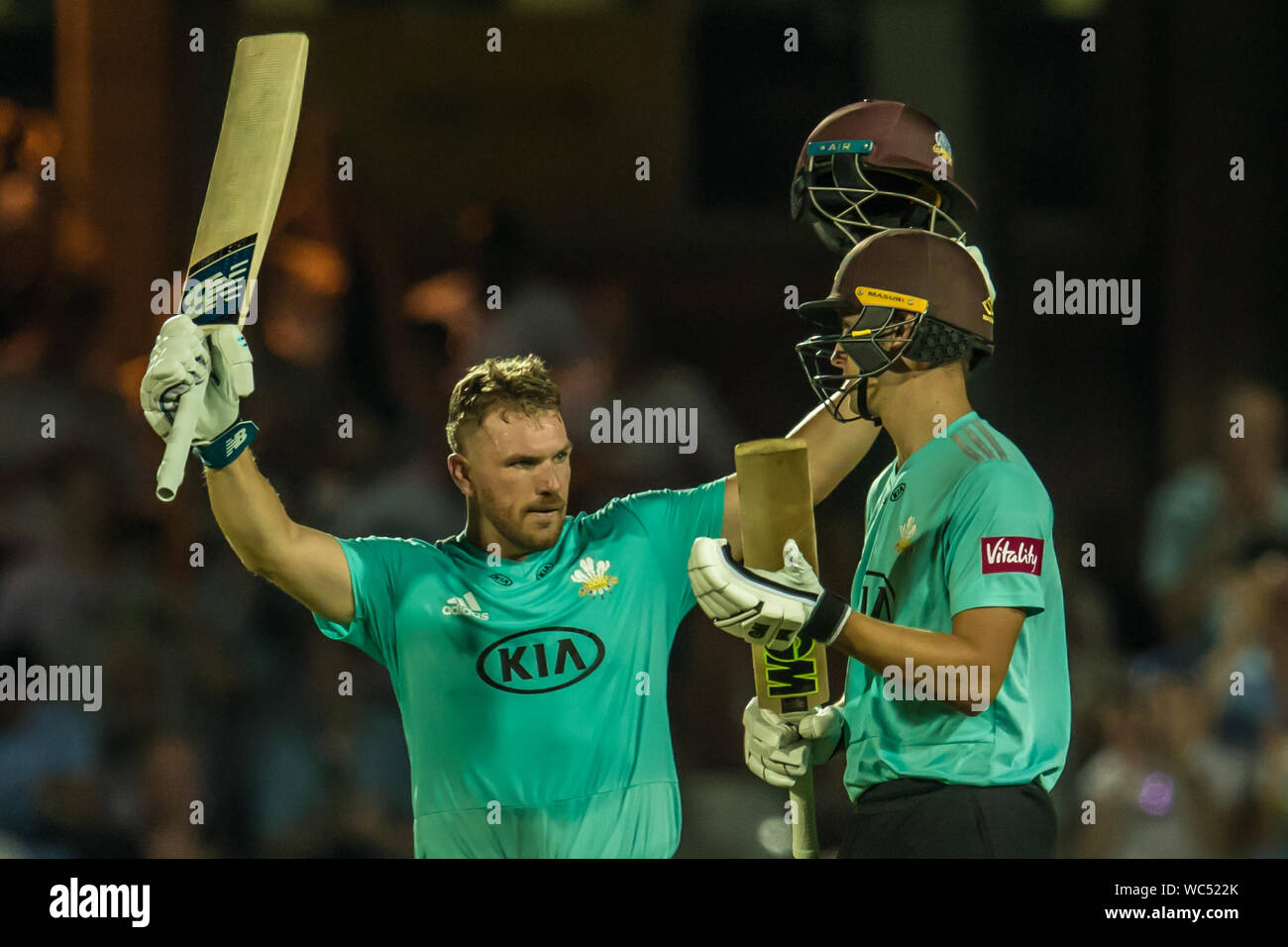 London, UK. 27 August, 2019. Aaron Finch salutes the crowd after getting his hundred batting for Surrey against Somerset in the Vitality T20 Blast match at the Kia Oval. David Rowe/Alamy Live News Stock Photo