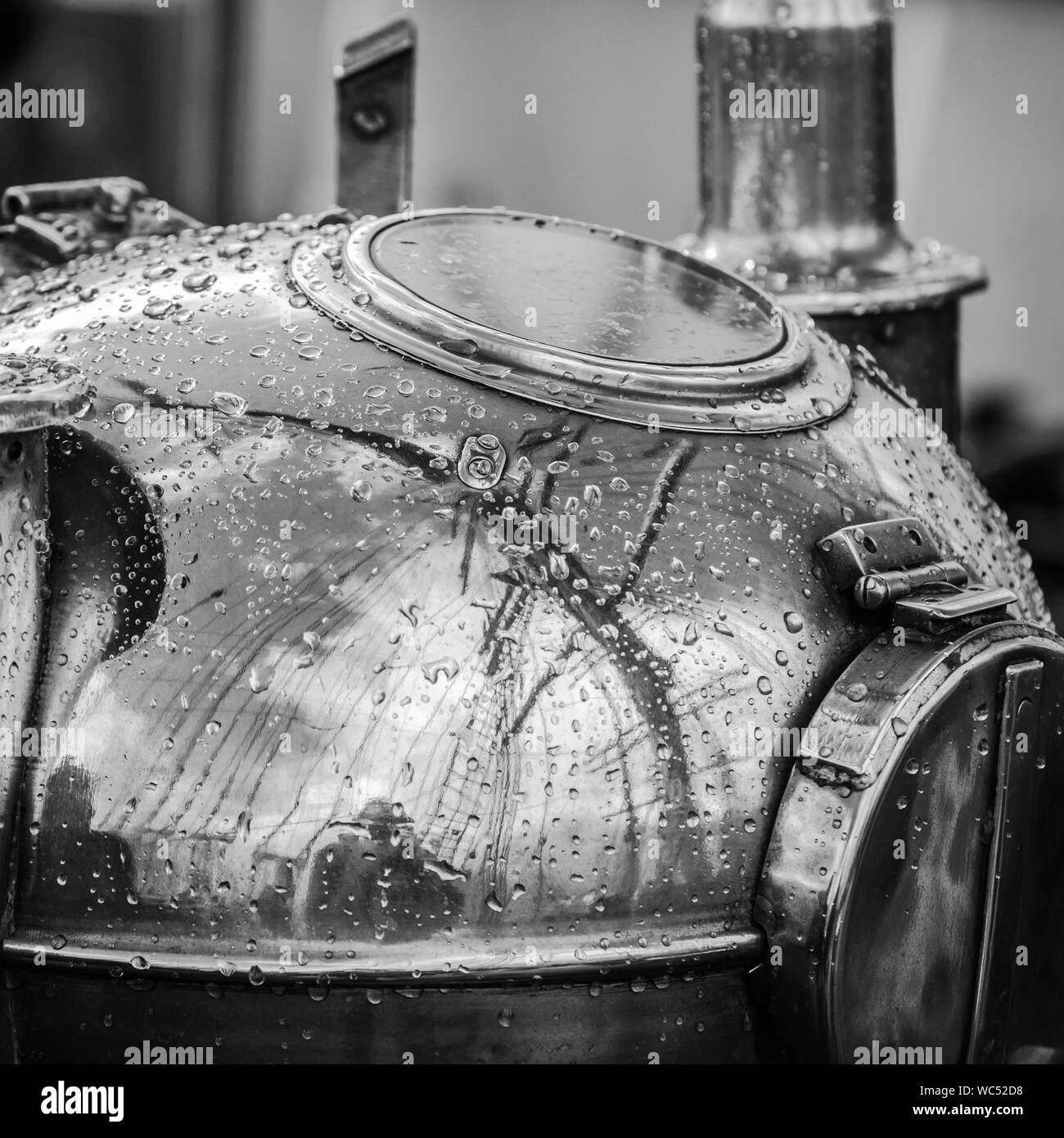 Reflection of a mast in an old ship compass, closeup. Black and white photo Stock Photo