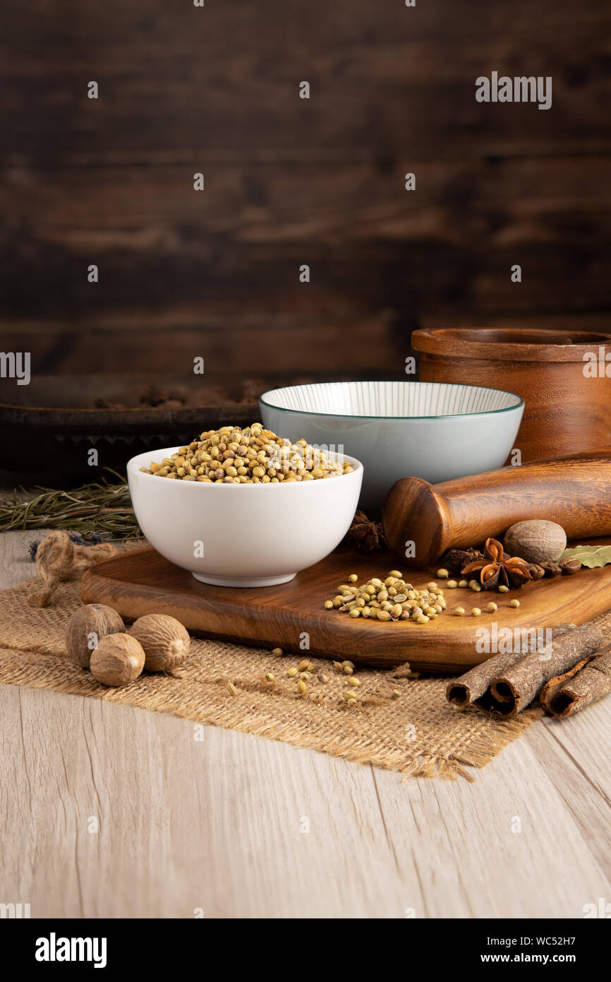 Dry Coriander Seeds in a bowl and food preparation and kitchen setting