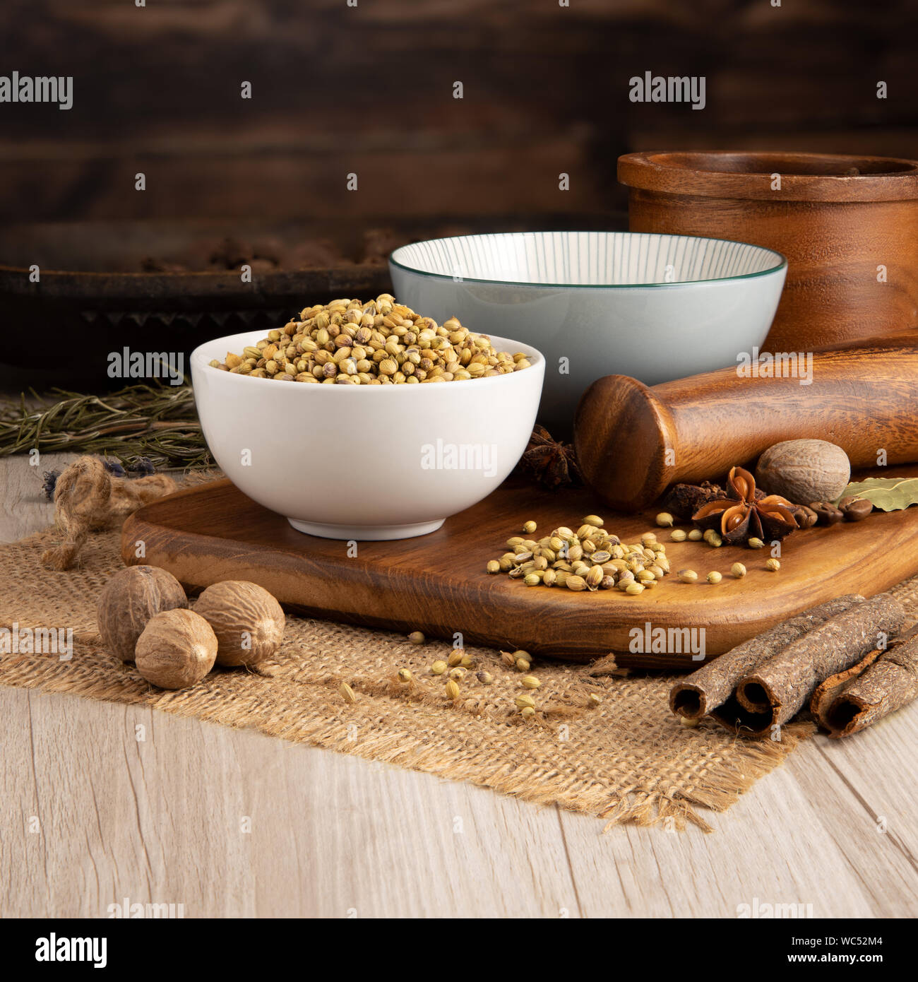 Dry Coriander Seeds in a bowl and food preparation and kitchen setting
