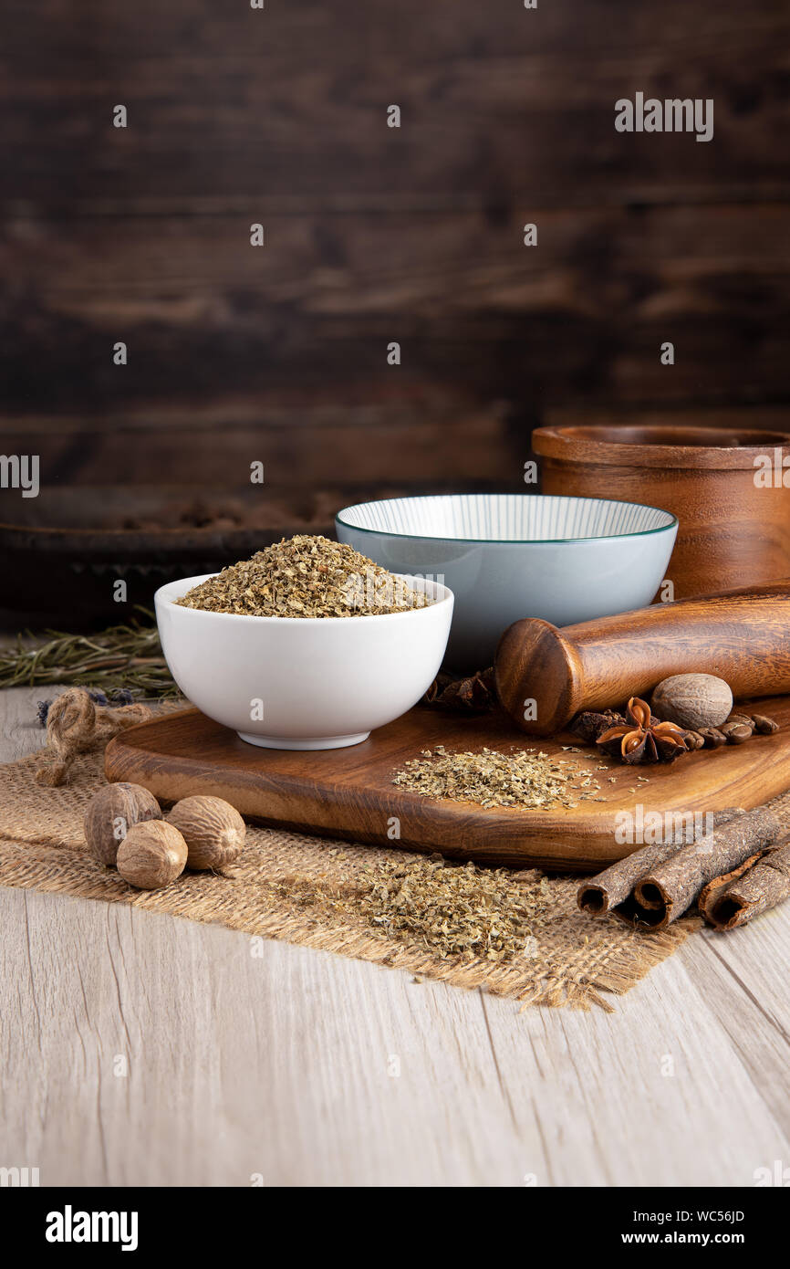 Marjoram Dried, in a bowl and food preparation and kitchen setting Stock Photo Alamy