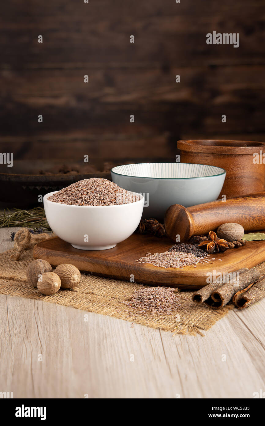 Psyllium Seeds in a bowl and food preparation and kitchen setting Stock Photo