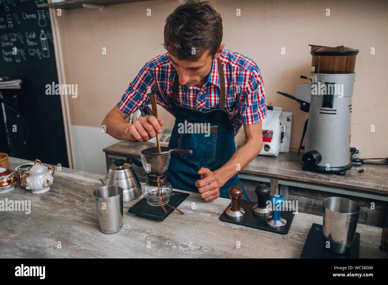 https://c8.alamy.com/comp/WC58GW/hand-drip-coffeedrip-coffee-glass-kits-in-a-coffee-shop-cafe-WC58GW.jpg