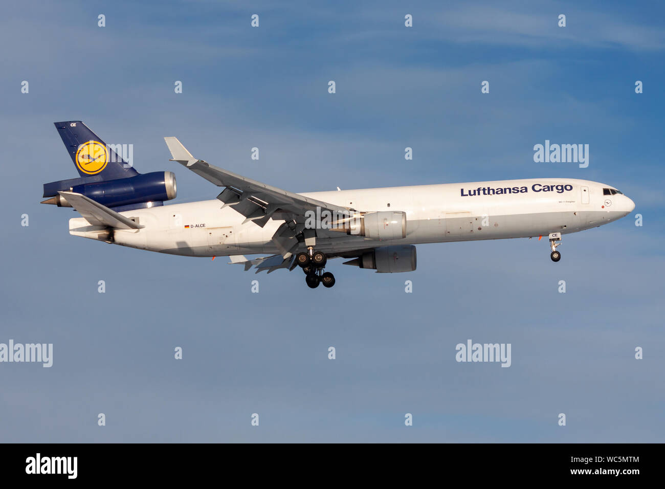 FRANKFURT / GERMANY - DECEMBER 8, 2012: Lufthansa Cargo MD-11 D-ALCE cargo plane landing at Frankfurt Airport Stock Photo