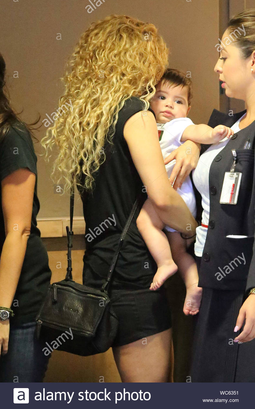 Blonde Man Baby Black Hair Stock Photos Blonde Man Baby Black