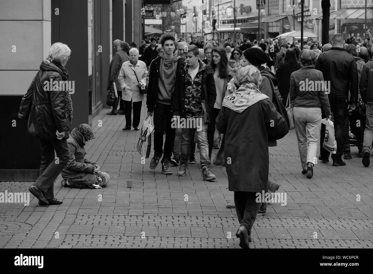 Ignoring The Crowd Black and White Stock Photos & Images - Alamy