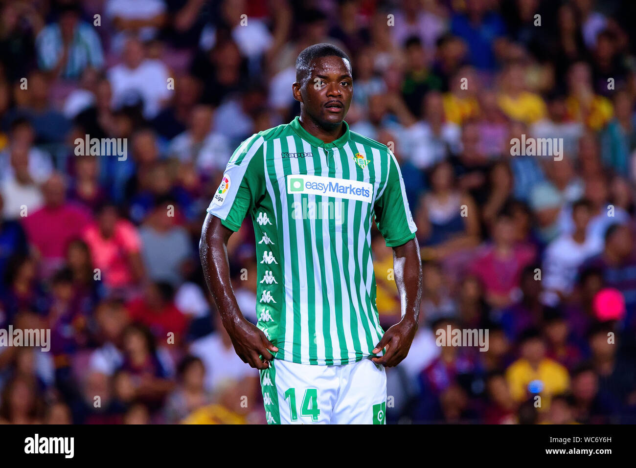 BARCELONA - AUG 25: William Carvalho plays at the La Liga match between FC Barcelona and Real Betis at the Camp Nou Stadium on August 25, 2019 in Barc Stock Photo