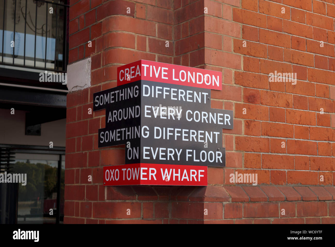 Sign on a wall at OXO Tower Wharf on the South Bank of the Embankment of the River Thames in Southwark, London SE1 advertising Creative London shops Stock Photo