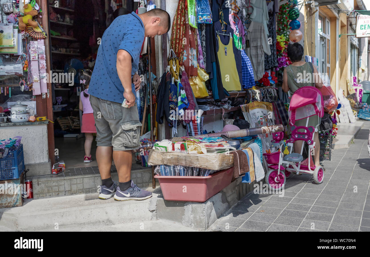 Belgrade, Serbia, August 9th 2019: Man entering a sundry store in Zemun Stock Photo