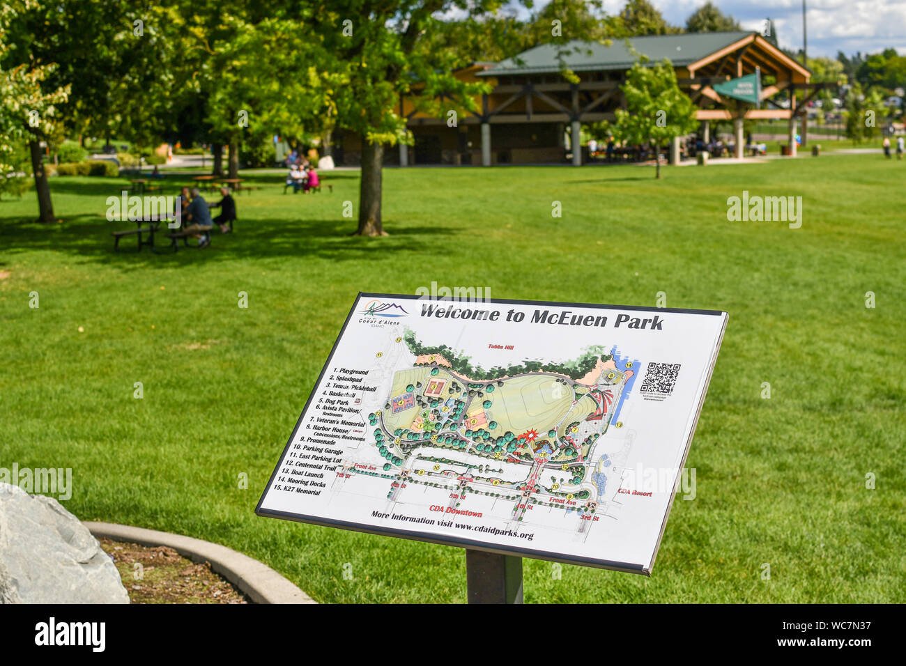 A directory sign with map of McEuen Park, a public park in the resort mountain town of Coeur d'Alene, Idaho Stock Photo