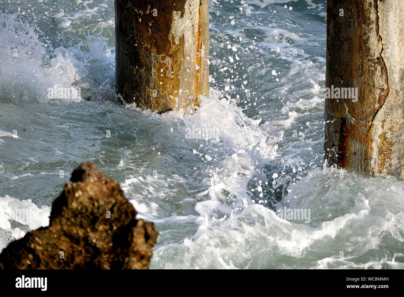 Rock splashing in water hi-res stock photography and images - Alamy