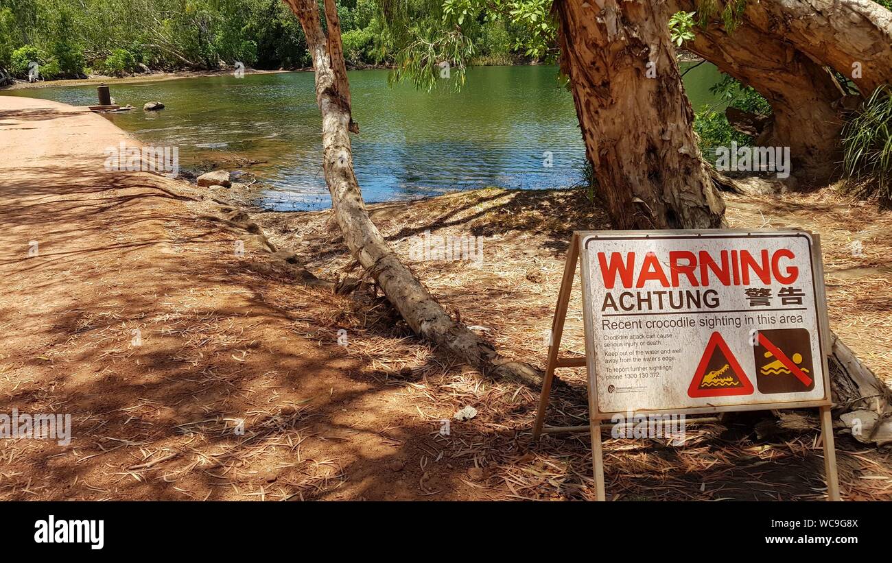 Crocodile warning sign near the causeway at Kalpowar Crossing, Lakefield National PArk, Cape