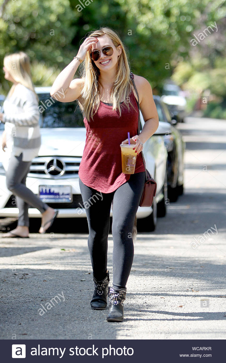 Malibu, CA - Hilary Duff arrives at her sister, Haylie's home in Malibu  with a gal pal. The actress was in a cheerful mood this afternoon and had  some laughs while making