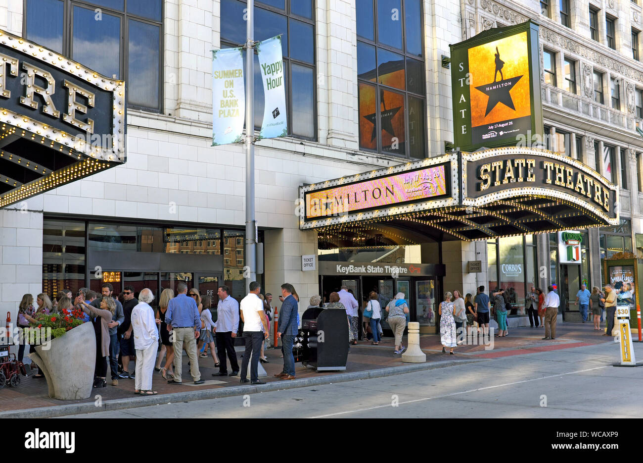 People gather outside the Playhouse Square State Theatre prior to a 2018 production of Hamilton in the Theater District of Cleveland, Ohio, USA. Stock Photo