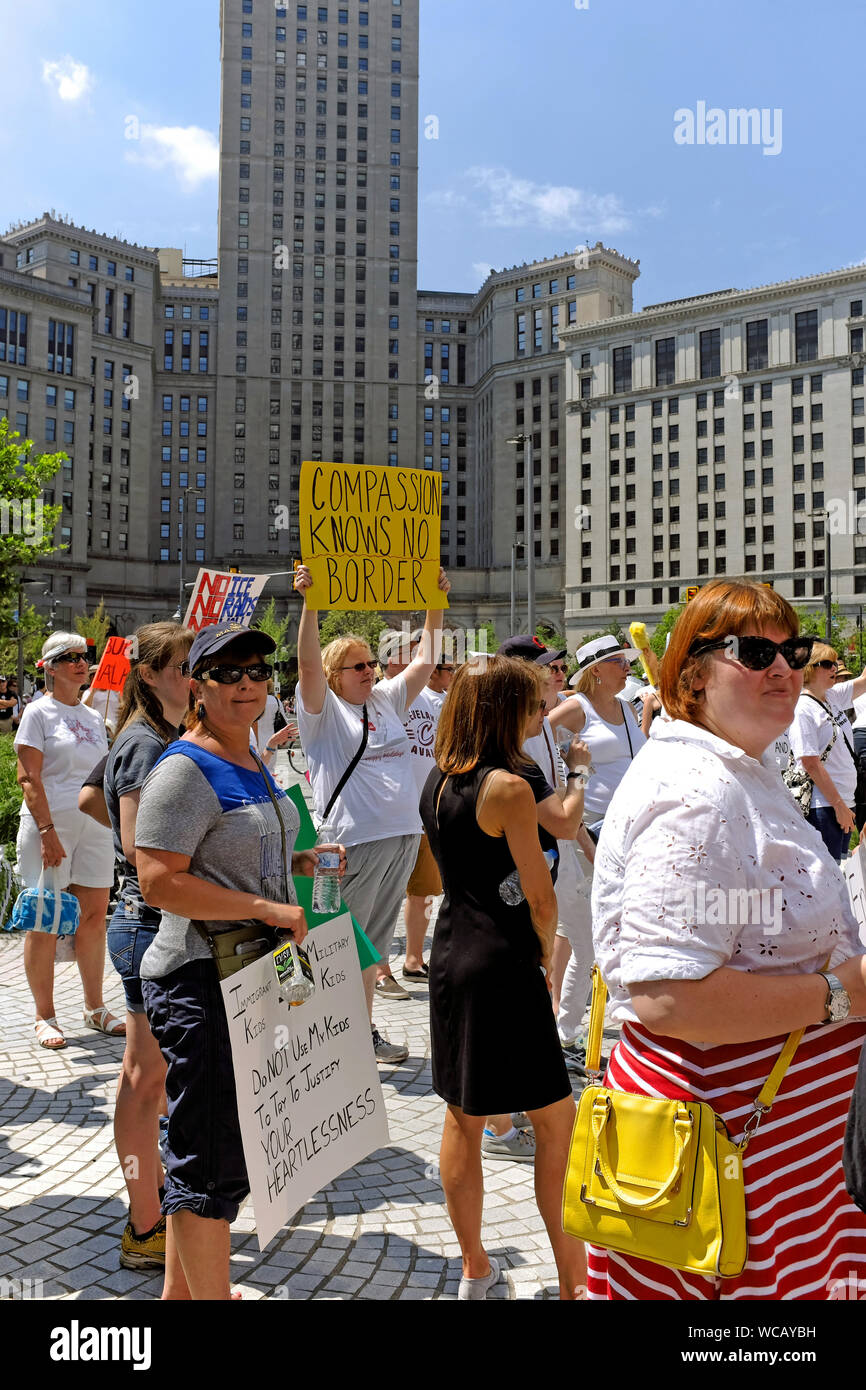 Compassion Knows No Borders sign at a Cleveland, Ohio rally against US immigration policy changes and treatment of immigrants. Stock Photo