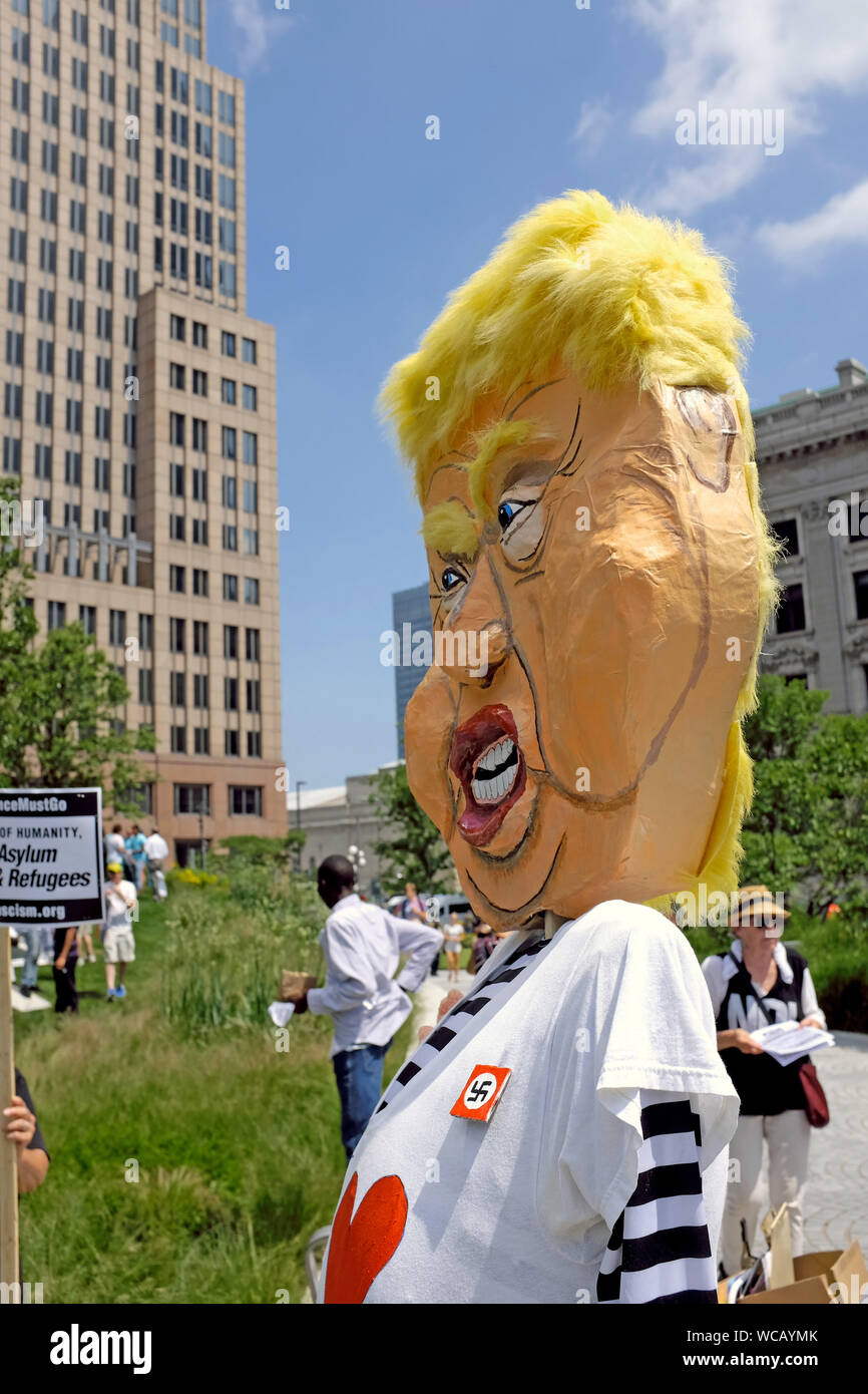 A paper mache caricature of President Trump is displayed with a Nazi lapel on his shirt is displayed at a protest in Cleveland, Ohio, USA. Stock Photo