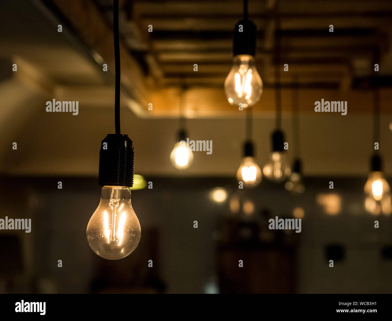 Vintage incandescence lightbulbs, with their iconic filament, hanging