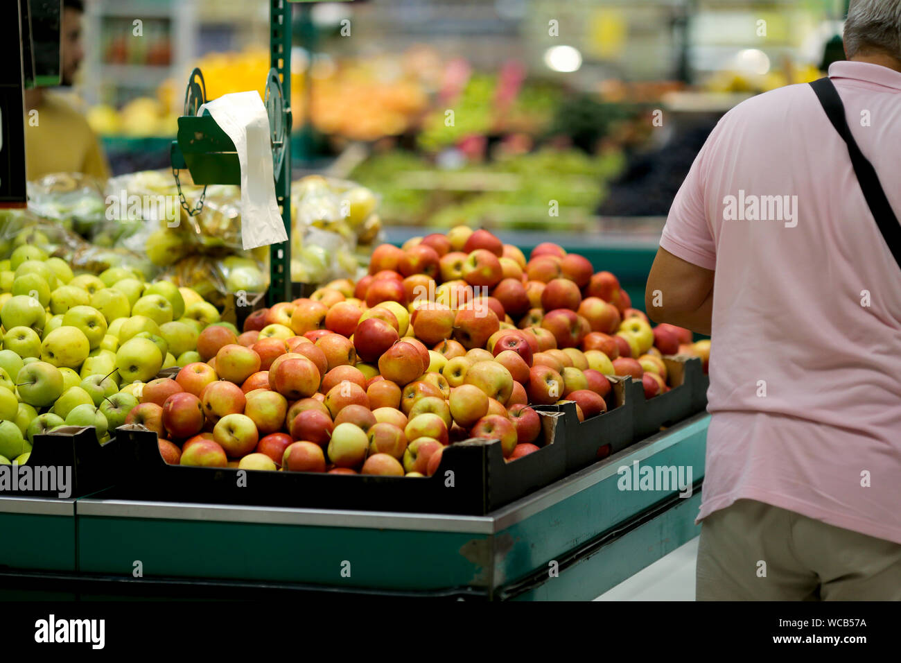 Biodegradable plastic food bags in the fruits and vegetables aisle in a big hypermarket in Romania Stock Photo