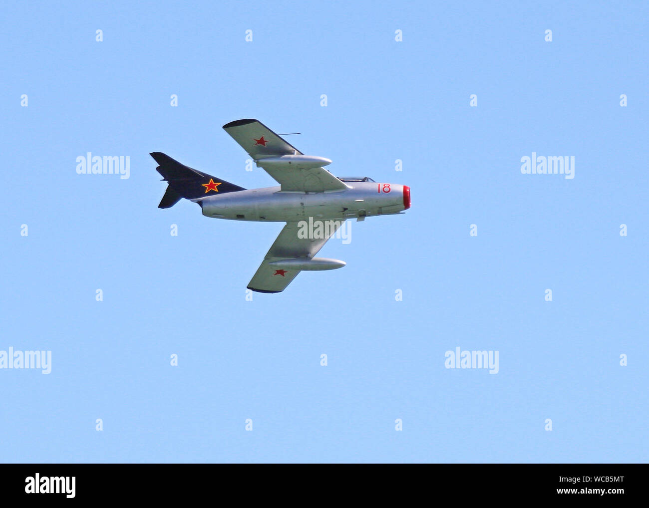 'Red 18' from the Norwegian Air Force Historical Squadron is a Soviet designed Mig-15 fighter. It was the first swept winged jet fighter in the world. Stock Photo