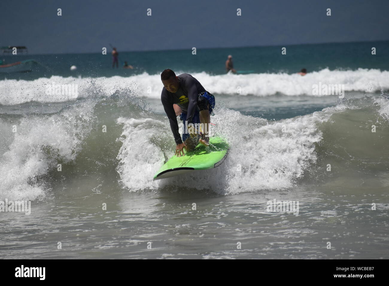 Surfing at Stinky's, Punta de Mita, Mexico Stock Photo