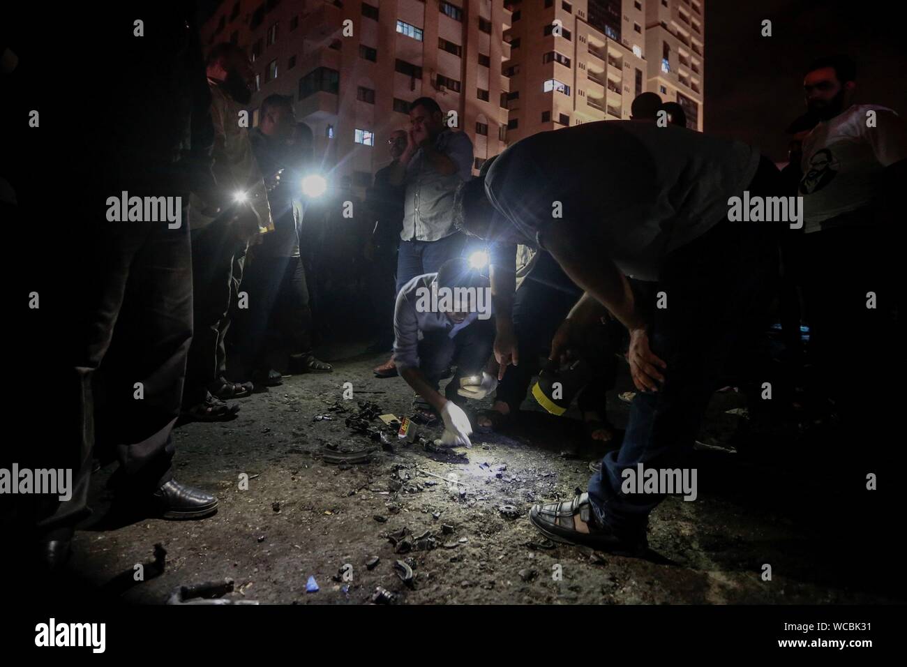 Gaza, Palestine. Autonomous Areas. 27th Aug, 2019. Palestinians are investigating the site of an explosion. According to the radical Islamic Hamas, two Palestinian policemen died in an explosion south of the city of Gaza. Credit: Mohammed Talatene/dpa/Alamy Live News Stock Photo