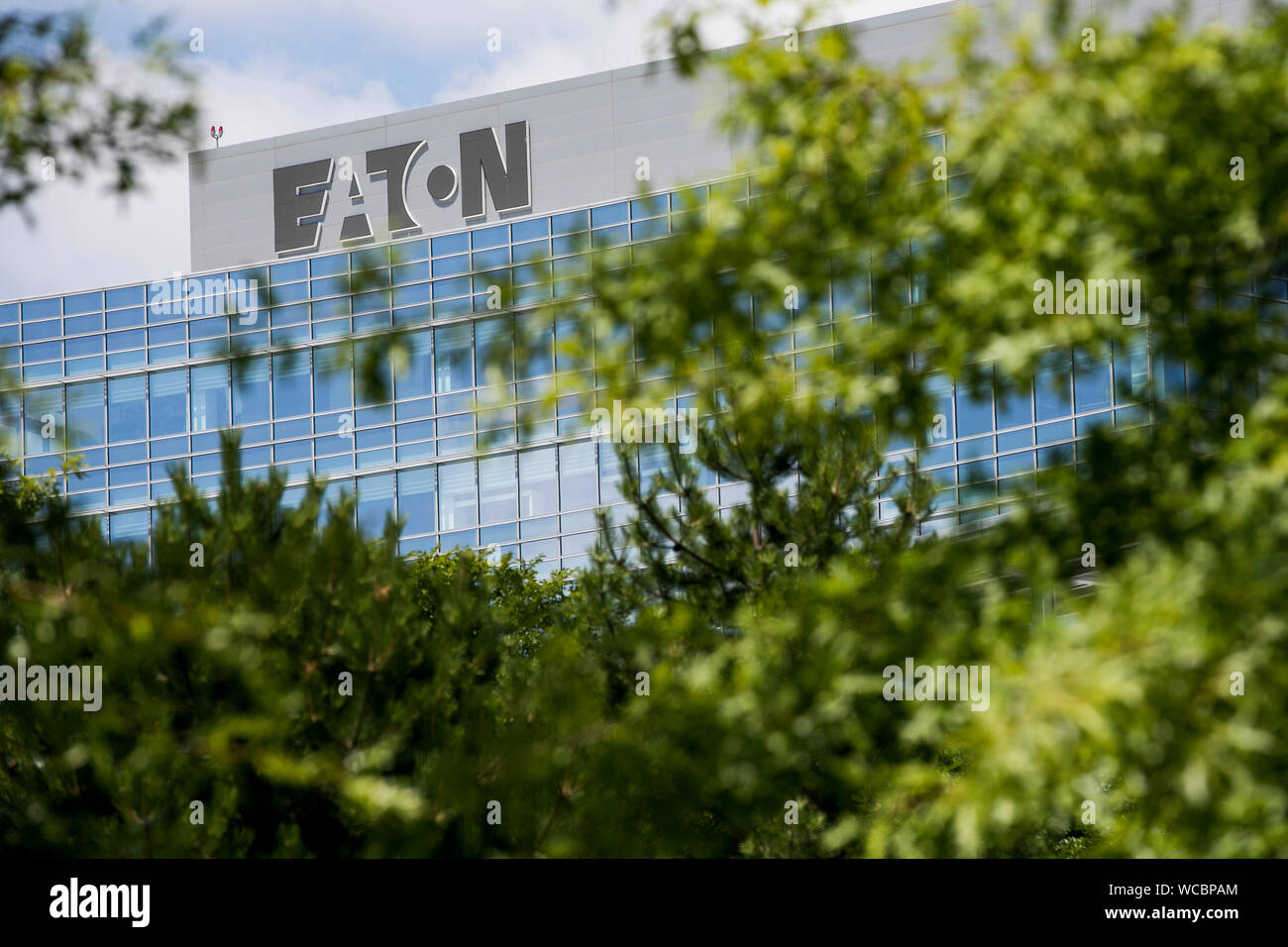 A logo sign outside of the operational headquarters of the Eaton Corporation in Beachwood, Ohio on August 11, 2019. Stock Photo