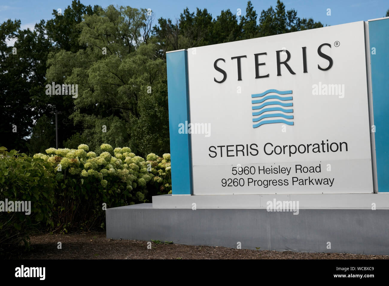 A logo sign outside of a facility occupied by the Steris Corporation in