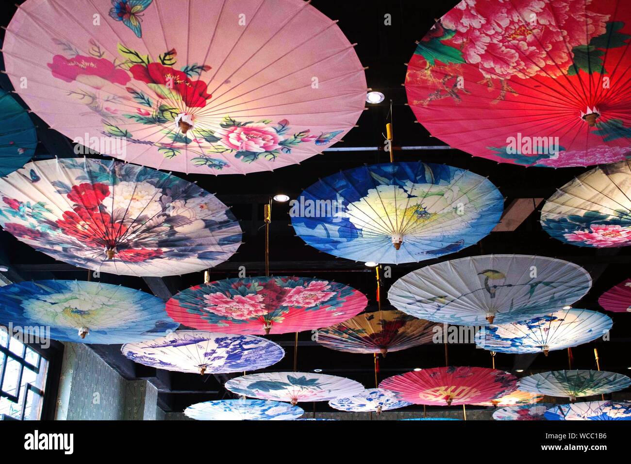 Umbrellas hanging upside down in hires stock photography and images