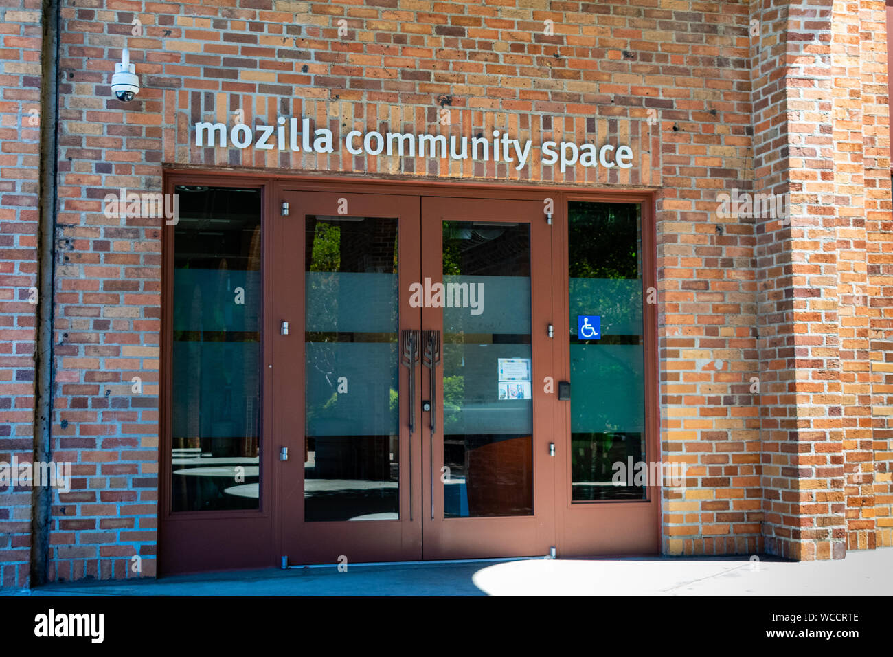 Mozilla Community Space entrance. It is open environments where Mozillians can work side by side hacking, coding, designing, researching and creating Stock Photo