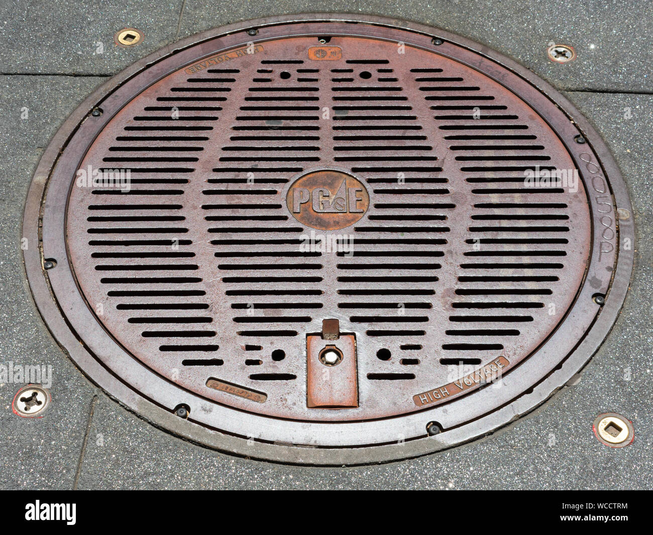 Pacific Gas and Electric PG&E Company high voltage manhole cover Stock Photo