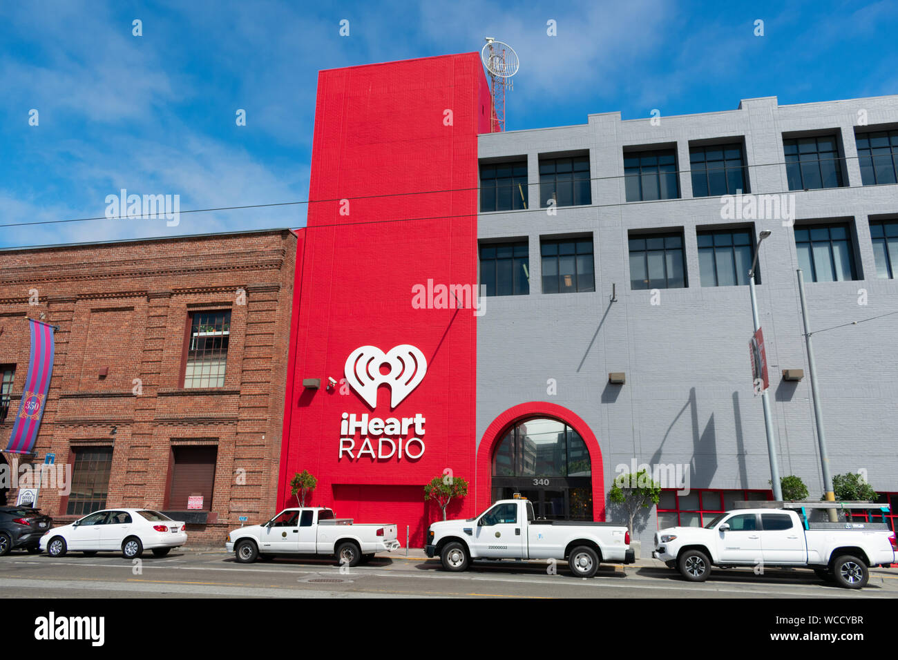 iHeart Radio sign and logo on company office facade. iHeartRadio is a free  broadcast and internet radio platform owned by iHeartMedia - San Francisco  Stock Photo - Alamy