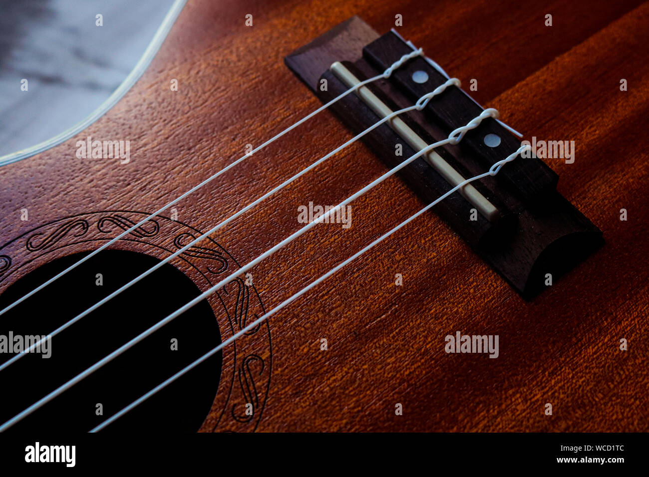Close up of hawaiian ukulele instrument of background Stock Photo Alamy