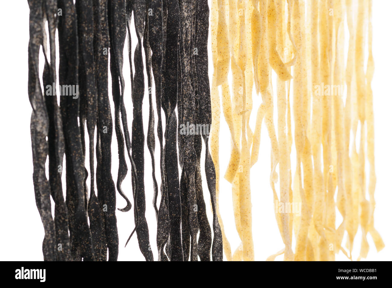 Various types of fresh homemade pasta. Raw pasta drying process