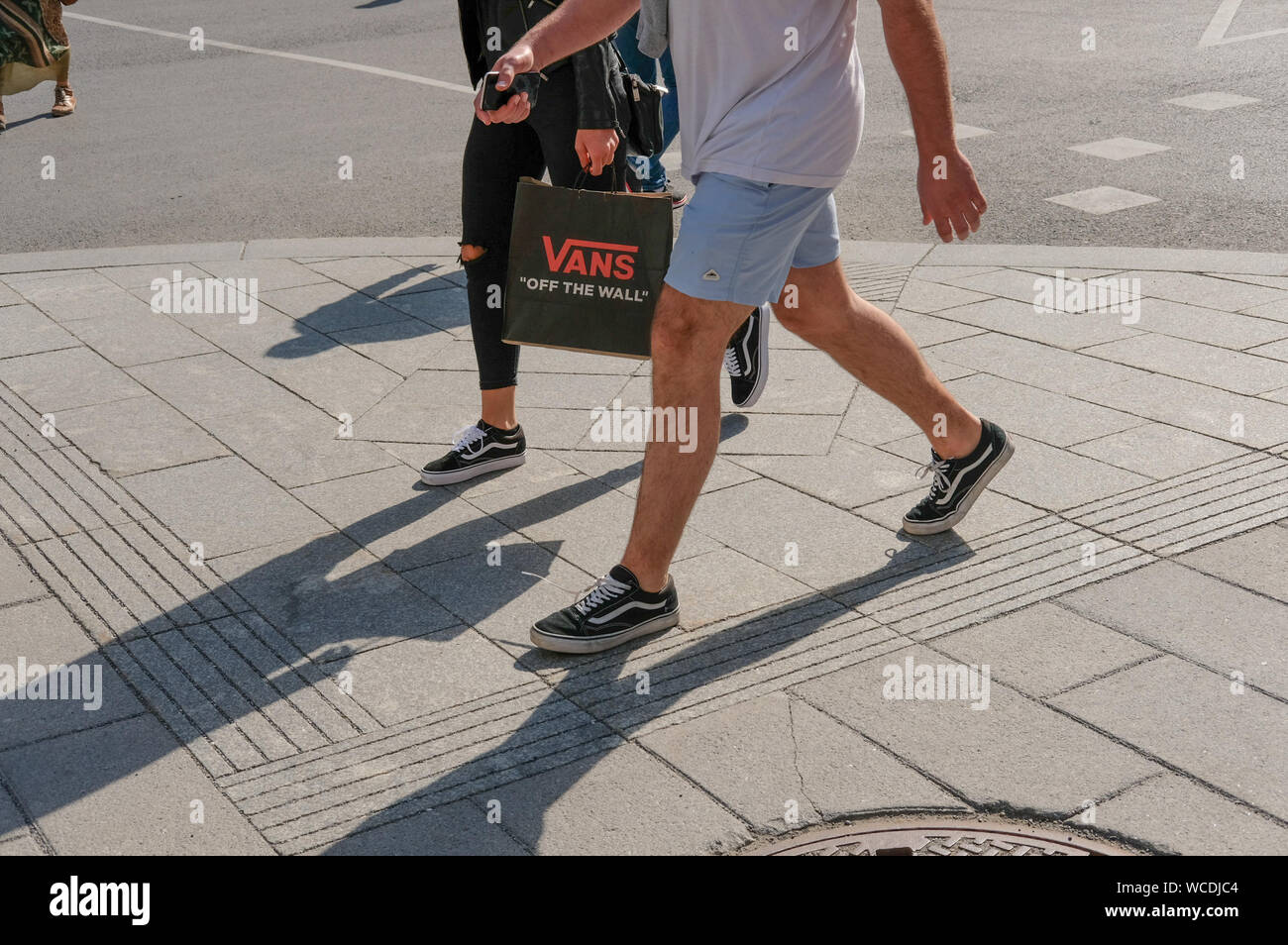 Vans Shoes and Shopping Bags Stock Photo