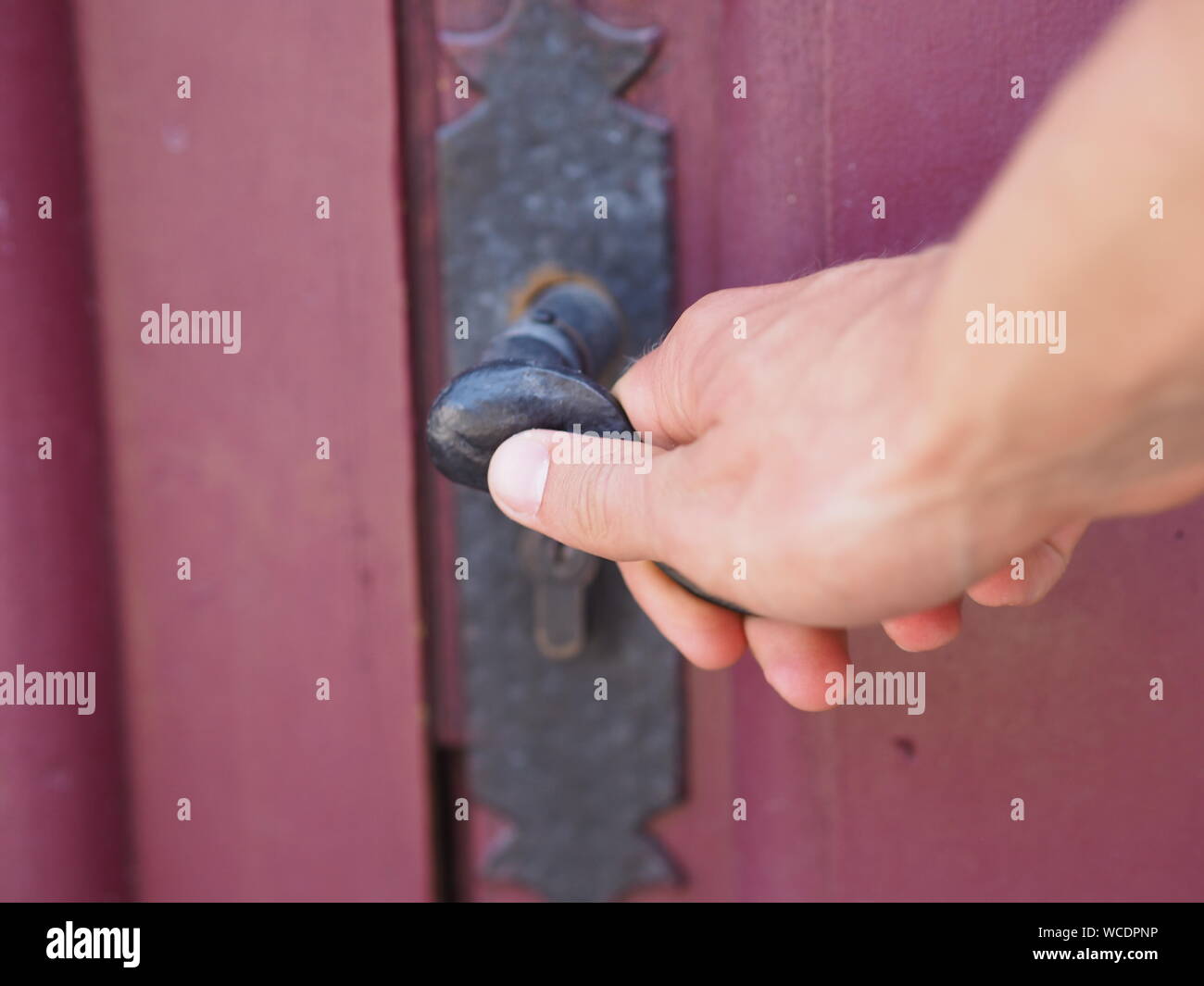Hand on door handle hires stock photography and images Alamy