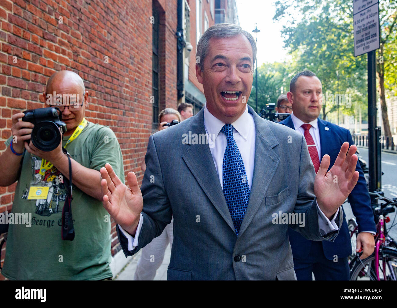 Brexit Party Leader, Nigel Farage, arrives for the Conference The Brexit Party holds a conference in London to announce 635 Prospective Parliamentary Stock Photo