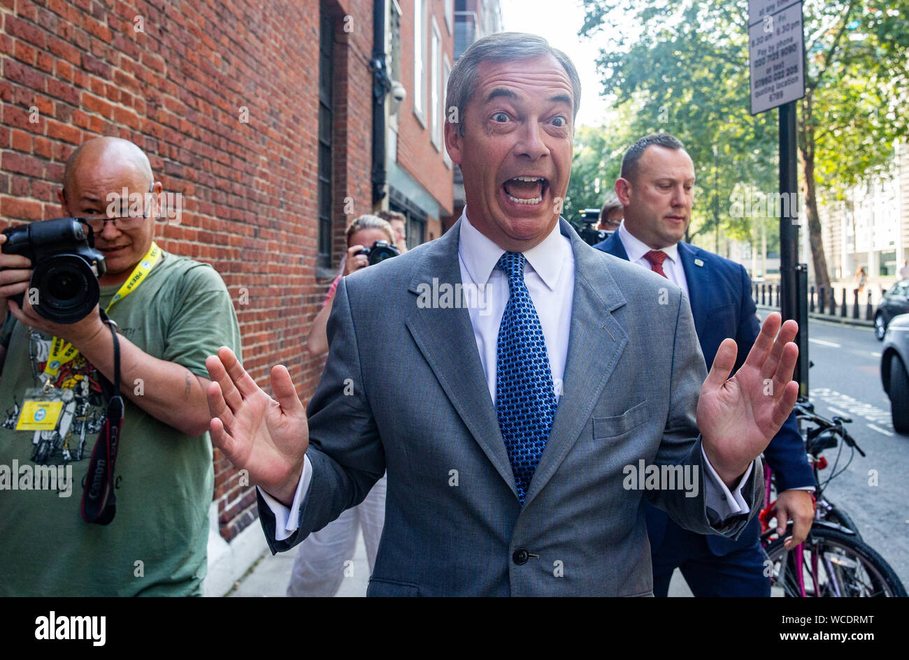 Brexit Party Leader, Nigel Farage, arrives for the Conference The Brexit Party holds a conference in London to announce 635 Prospective Parliamentary Stock Photo