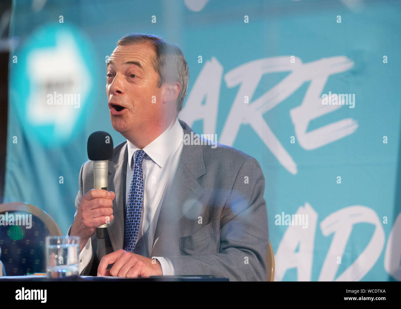 Brexit Party Leader, Nigel Farage, speaks at the Conference. The Brexit Party holds a conference in London to announce 635 Prospective Parliamentary c Stock Photo