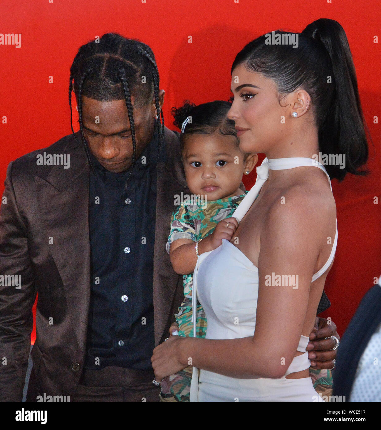 Santa Monica, California, USA. 28th Aug, 2019. Rapper Travis Scott and Kylie Jenner and their daughter Stormi attend the premiere of Netflix's 'Travis Scott: Look Mom I Can Fly' at Barker Hangar on August 27, 2019 in Santa Monica, California. 'Travis Scott: Look Mom I Can Fly' traces the Houston rapper's rise to super-stardom, focusing on the months surrounding Scott's third album 'Astroworld'.  Photo by Jim Ruymen/UPI Credit: UPI/Alamy Live News Stock Photo