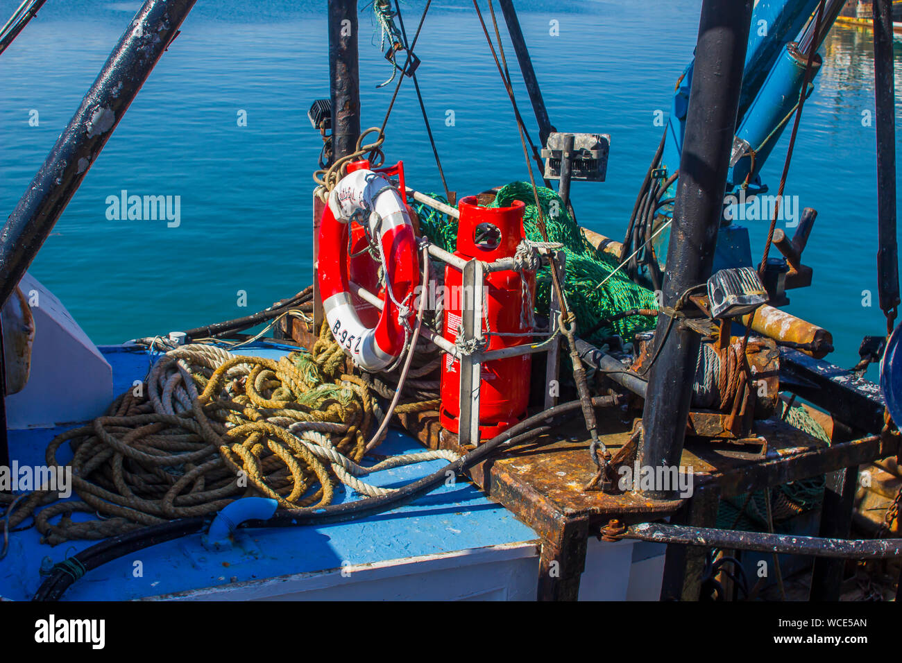 8 August 2019 The clutter stowed on the deck of a working trawler in berthed in Ardglass harbour County Down Northern Ireland Stock Photo